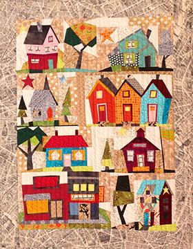 Laura Heine My Kinda Town Quilt Pattern Finished Size: 42"x54"