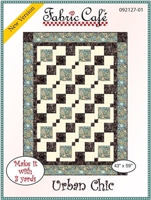 May include: Urban Chic quilt pattern by Fabric Cafe.  New version.  Features a 43' x 59' quilt design with a beige background, dark brown and teal squares, and a teal border.  The pattern uses 3 yards of fabric.  The design is modern and geometric.
